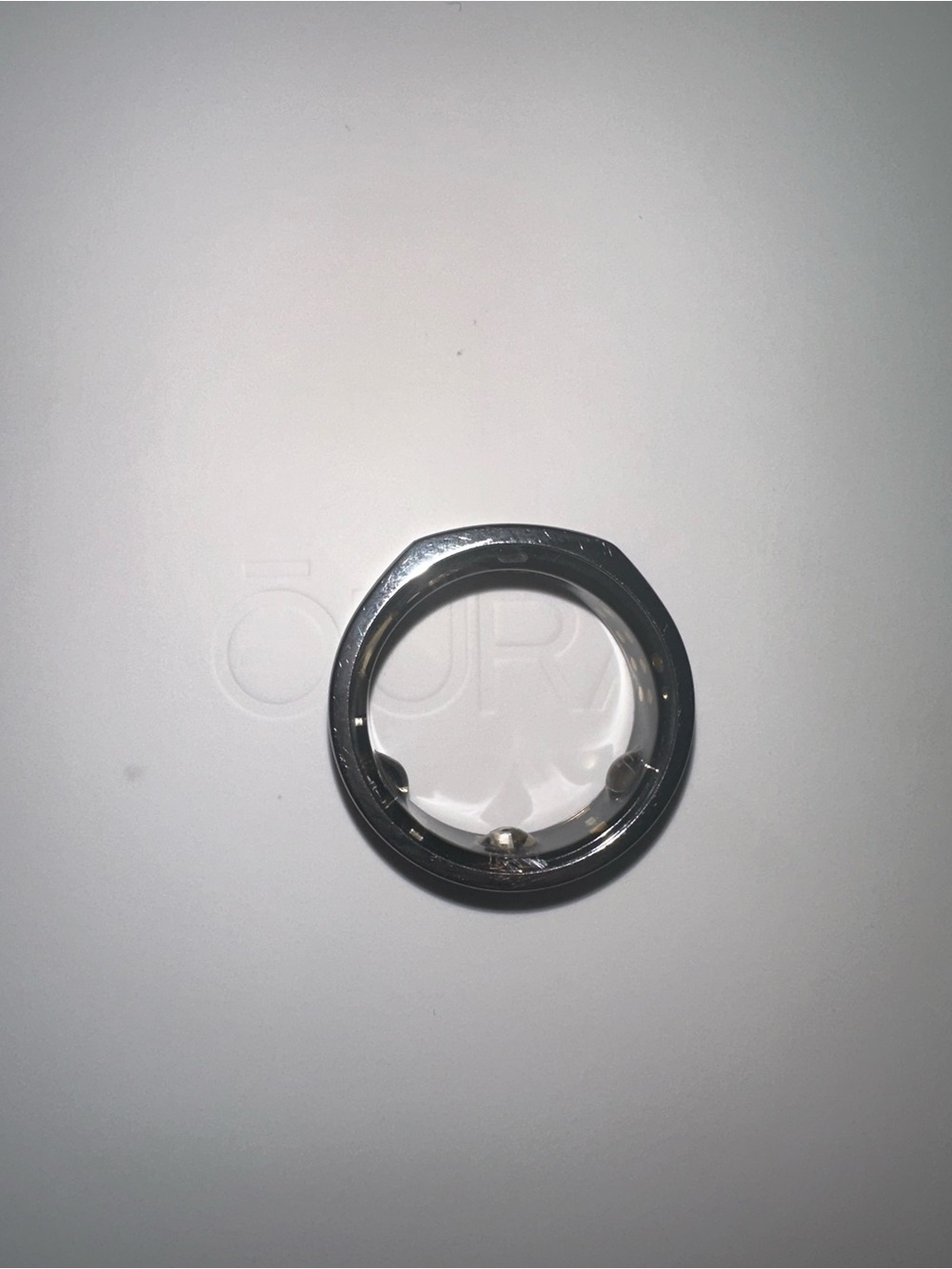 Oura Silver Tone Circular Ring Accent